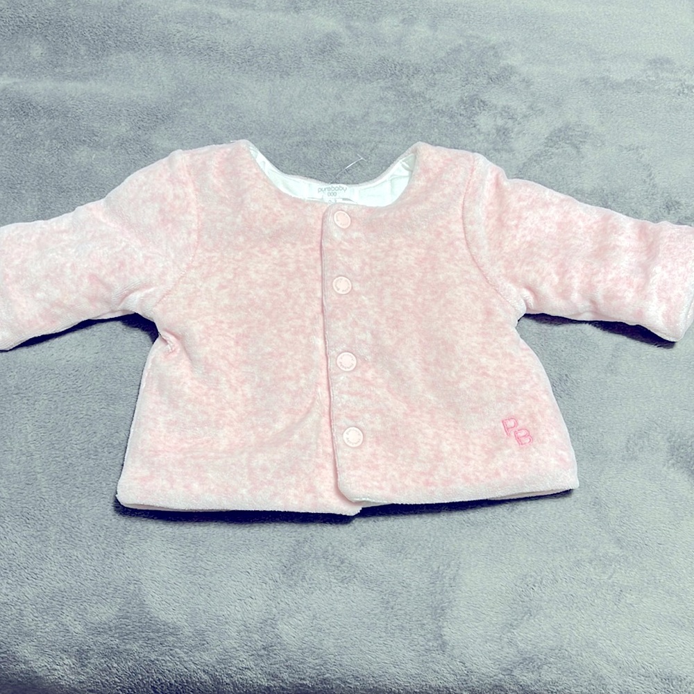 Australian brand.  Super soft, button up jacket.